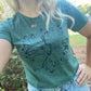 Green cropped flower T